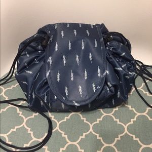 Lay and go style cosmetic bag. Like New.